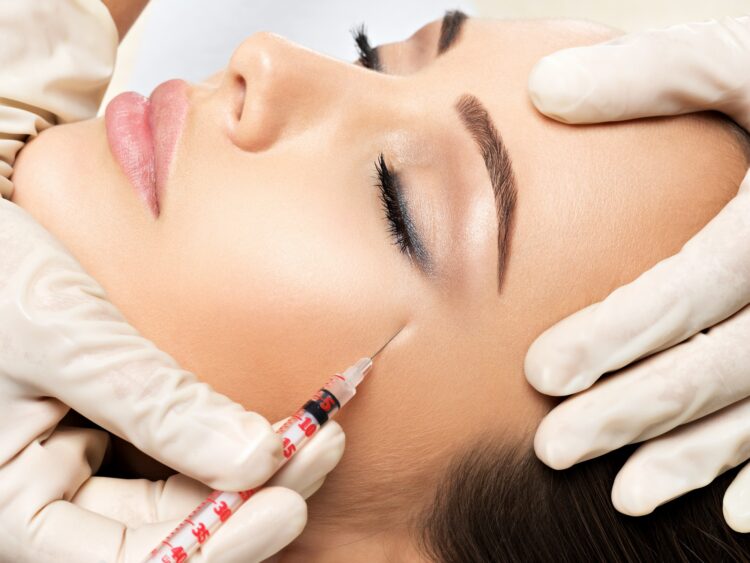 Woman getting cosmetic plastic surgery